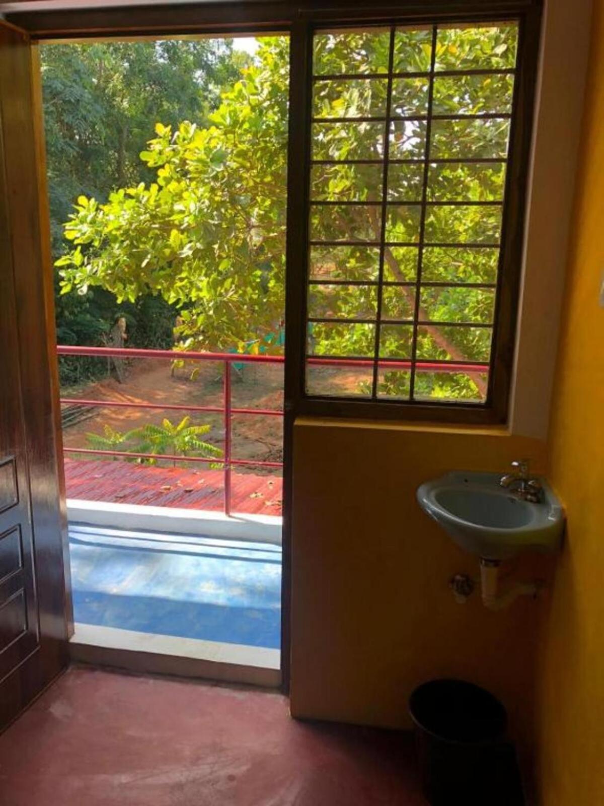 Hotel Travellers Crib Auroville Esterno foto